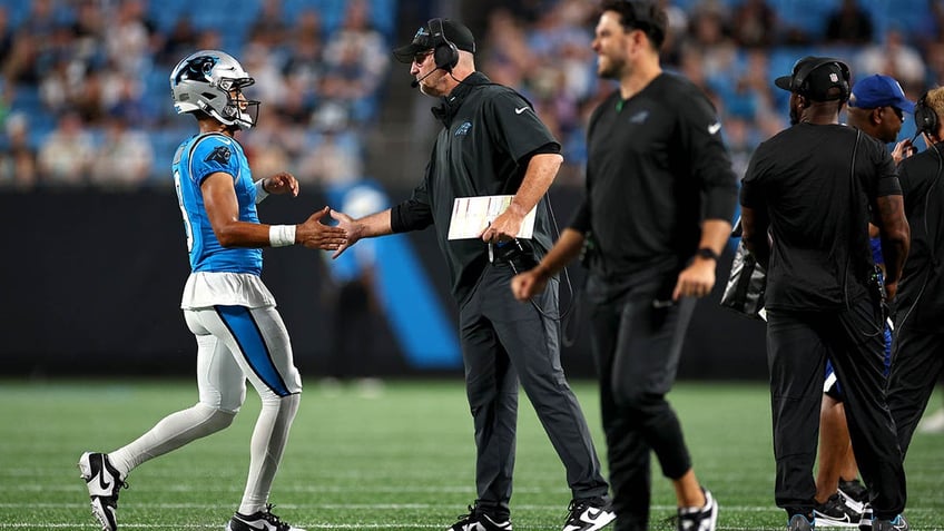 panthers frank reich voices support for qb bryce young amid winless start we got the guy we wanted