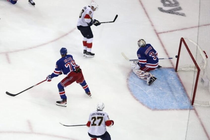 Igor Shesterkin of the New York Rangers allows a goal by Anton Lundell of the Florida Pant