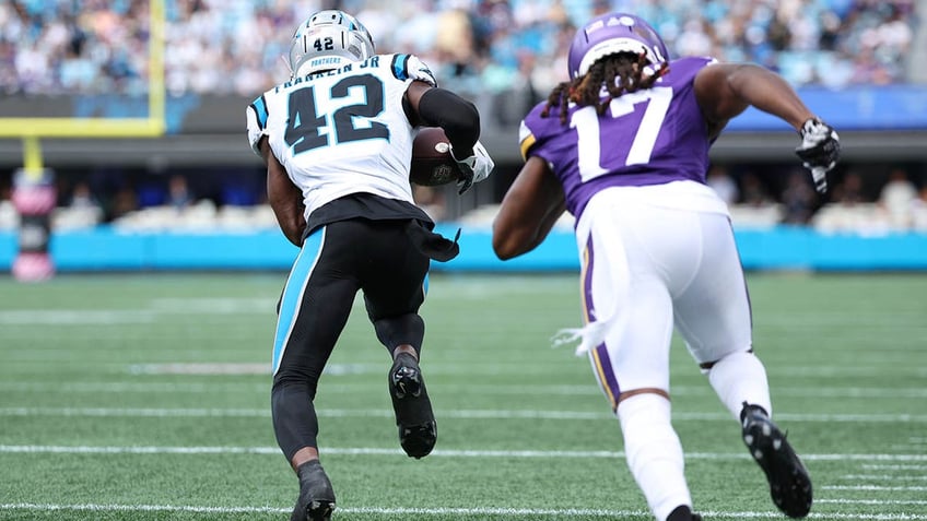 panthers sam franklin returns interception 99 yards for td kirk cousins crushed on rundown