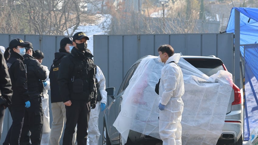 Members of the Korea Crime Scene Investigation team