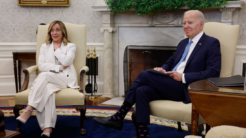 President Joe Biden (R) and Italian Prime Minister Giorgia Meloni meeting in the Oval Office at the White House on March 1, 2024 in Washington, DC. Biden welcomed her to the White House for the second time in a year, praising Italy's continued support for Ukraine following Russia's 2022 full-scale invasion. (Photo by Chip Somodevilla/Getty Images)