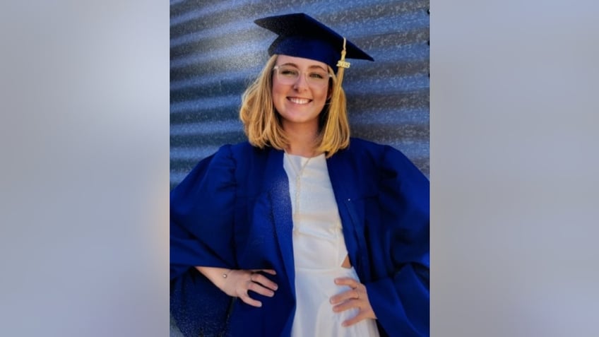 Louise Jean Wilson in a graduation cap and gown