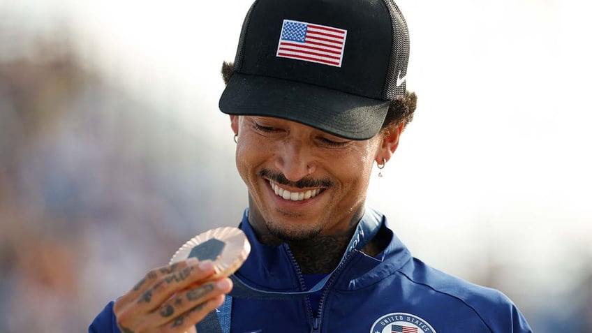 Nyjah Huston holds his medal