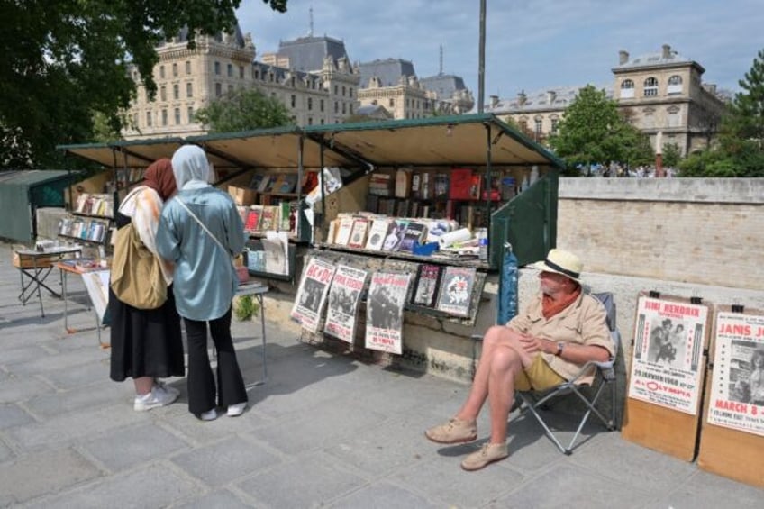 The Parisian booksellers' booths are a familiar sight along the river Seine