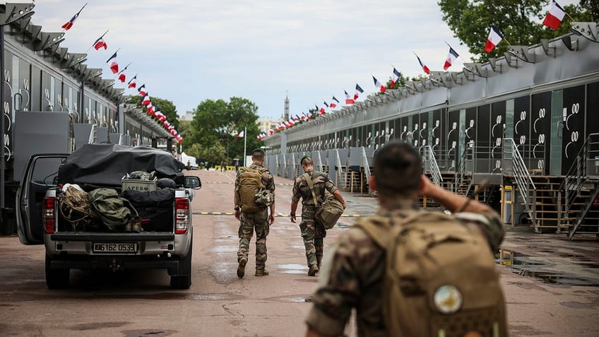 French Soldiers walking in camp