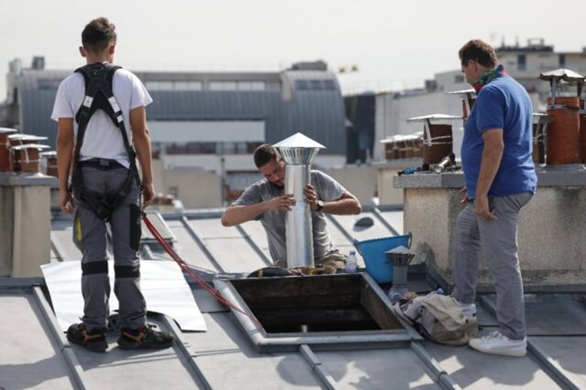 Paris hopes to attract more young people to the zinc roofing trade