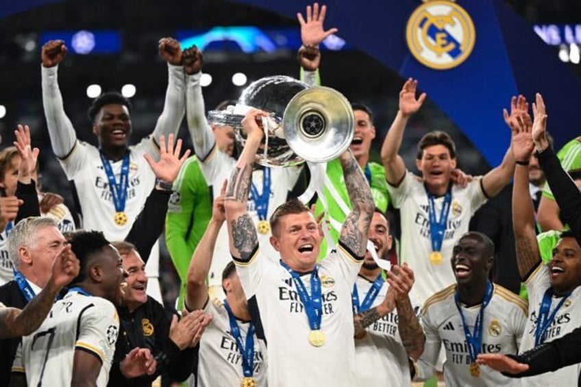 Toni Kroos (centre)won a record-equalling sixth Champions League as a player in the final