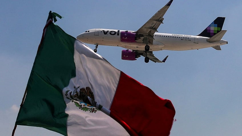 Volaris airplane and Mexican flag