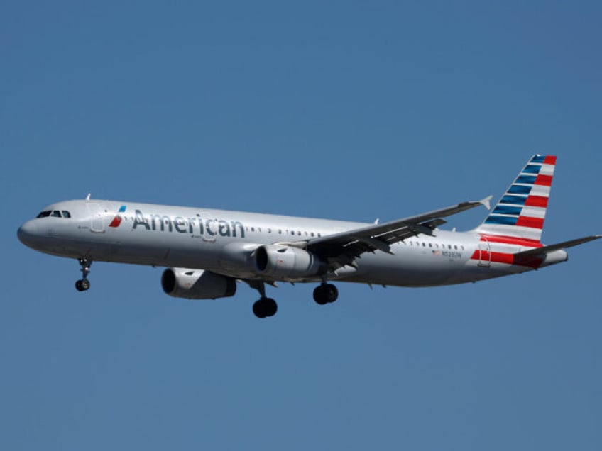 An American Airlines Airbus A321-231 aircraft approaches San Diego International Airport f