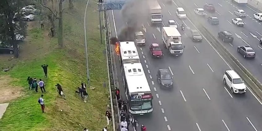 passengers on argentina bus run for their lives after public bus becomes engulfed in flames