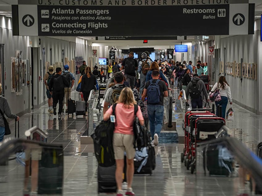 Passengers head to US Customs at Hartsfield-Jackson Atlanta International Airport (ATL) in Atlanta. In 2022, around 93.7 million people traveled through Hartsfield-Jackson Atlanta International Airport, an increase of 23.8% in passenger traffic from 2021, according to a report released by Airports Council International. (Photo by Camilo Freedman/SOPA Images/LightRocket via Getty …