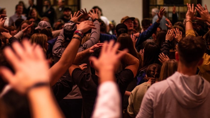 Worshipers in the chapel of Asbury University