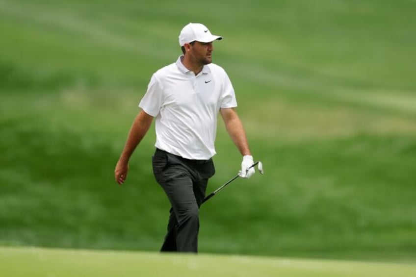 World number one Scottie Scheffler of the United States walks to the 18th green at Oakmont