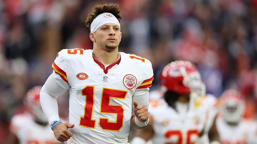 Patrick Mahomes runs to the locker room