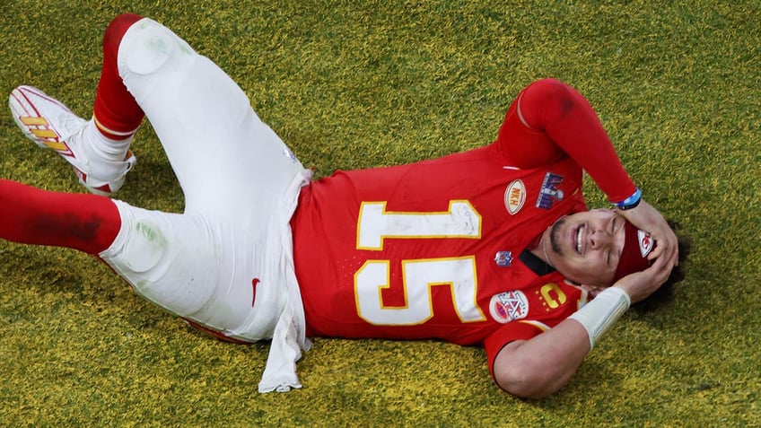 Patrick Mahomes on ground after win