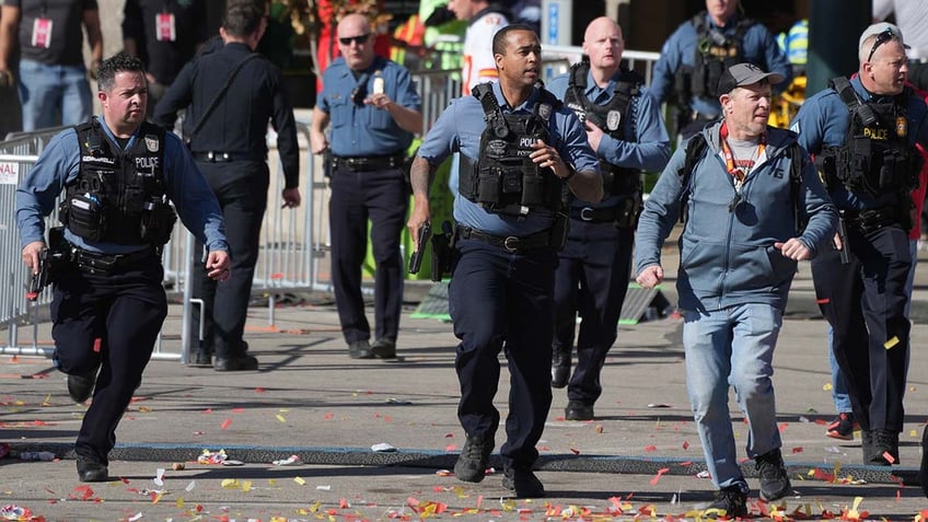 Police respond after gunshots were fired after the Kansas City Chiefs' Super Bowl victory parade