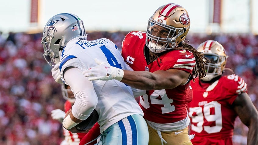 Fred Warner tackles Dak Prescott