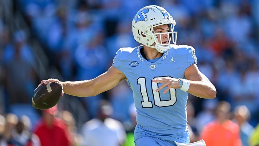 Drake Maye looks to pass against Syracuse