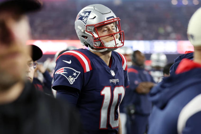 Mac Jones of the New England Patriots reacts on the sideline during the second half against the Chicago Bears at Gillette Stadium on October 24, 2022...