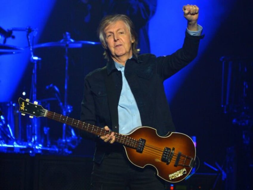 LONDON, ENGLAND - DECEMBER 16: Sir Paul McCartney performs live on stage at the O2 Arena d