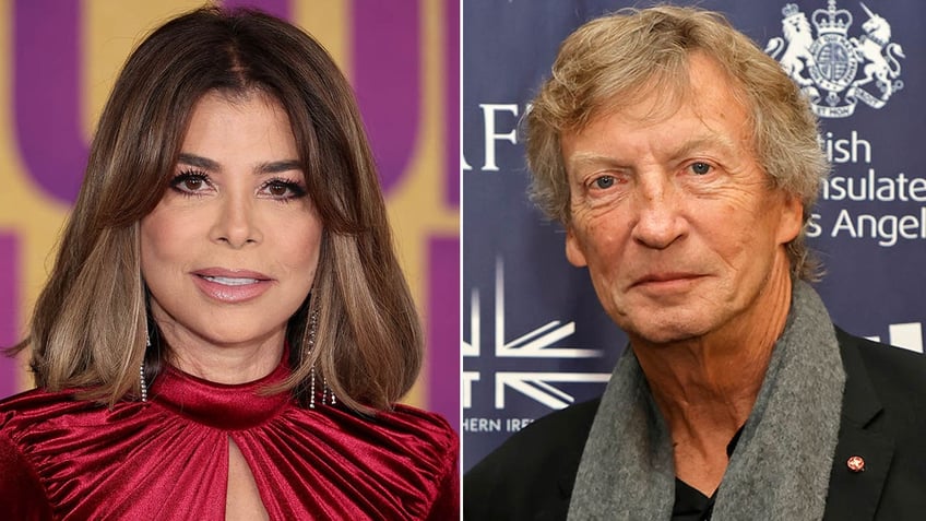 Paula Abdul in a red gown looks directly at the camera split Nigel Lythgoe wears a grey scarf and looks serious on the carpet