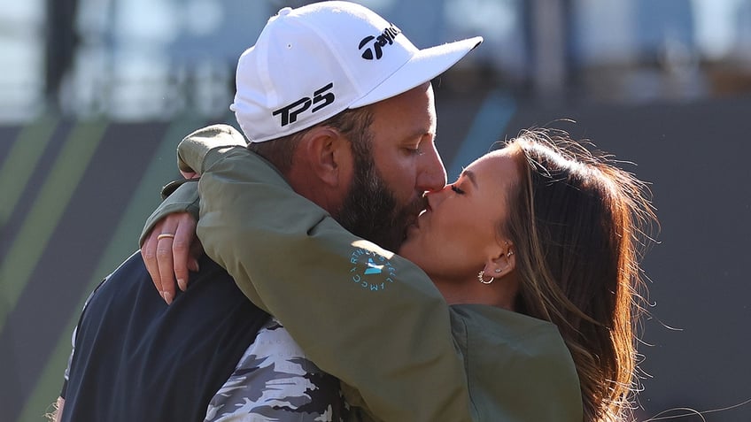 Dustin Johnson and Paulina Gretzky smooch