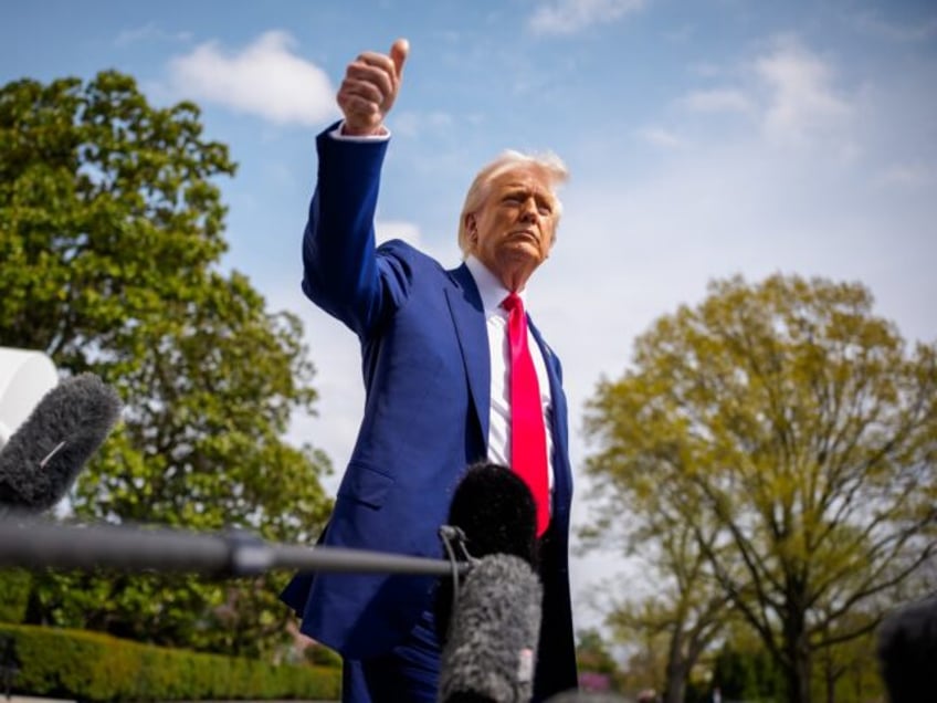 WASHINGTON, DC - APRIL 3: U.S. President Donald Trump gestures to members of the media bef