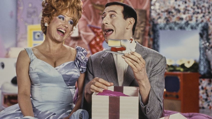 American actress Lynne Marie Stewart beside actor and comedian Paul Reubens in CBS children's TV series 'Pee-wee's Playhouse.'