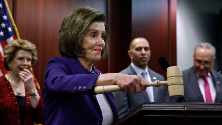 Nancy Pelosi bangs gavel