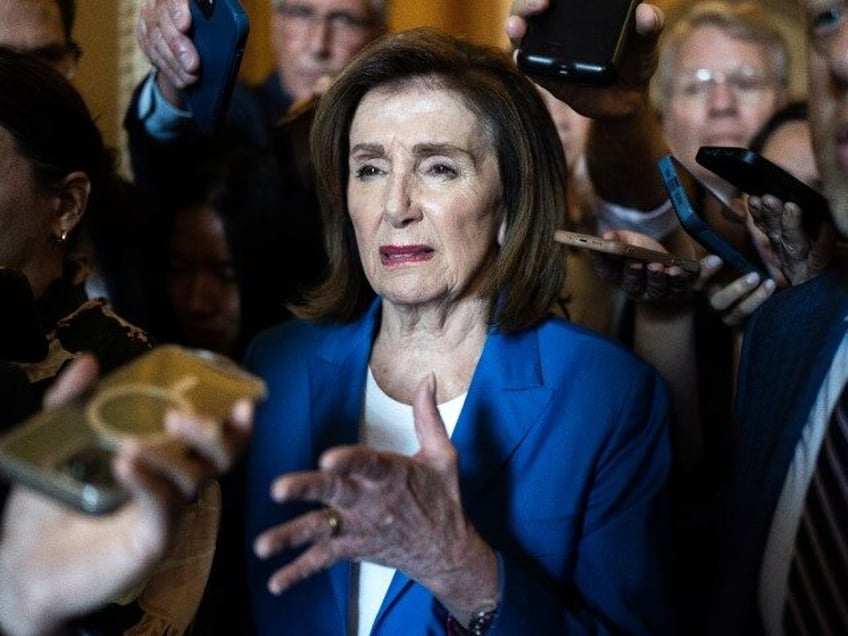 Rep. Nancy Pelosi, D-Calif., talks with reporters in the U.S. Capitol about the presidenti