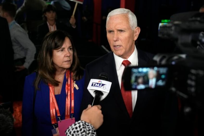 pence says elections are about choices after combative first debate performance