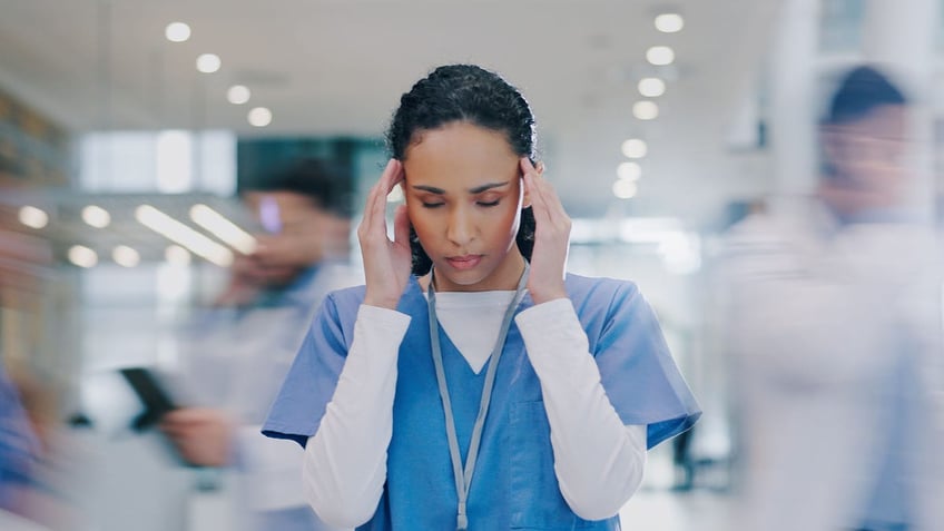 Stressed busy woman