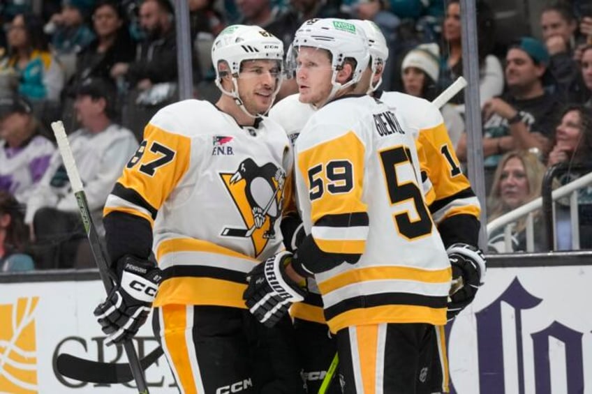 penguins win 10 2 hand sharks record tying 11th straight loss to start season