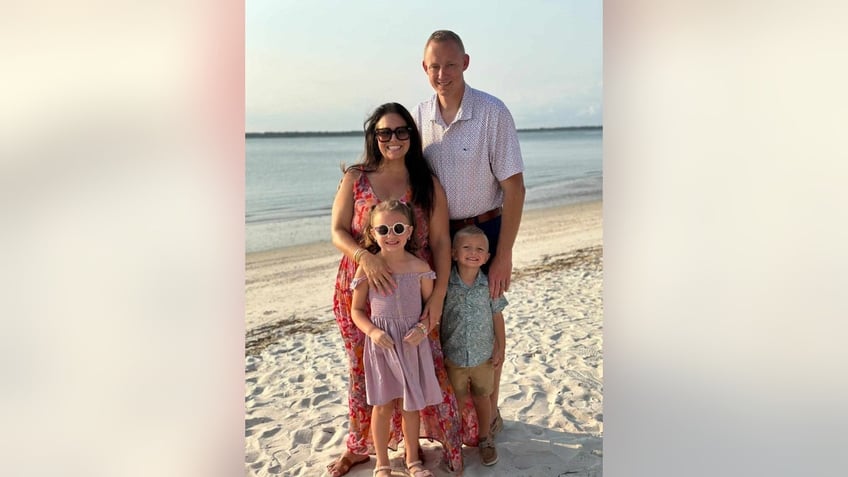 Bryan Hagerich and his family on the beach