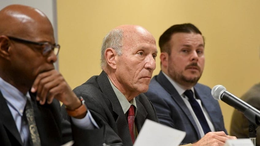 Stephen Kinsey, Thomas Caltagirone, and Kevin Boyle seen from left to right during a Pennsylvania assembly hearing 