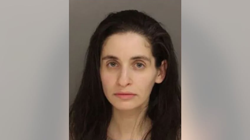 pennsylvania doctor allegedly tried setting home on fire belonging to grandmother of romantic rival