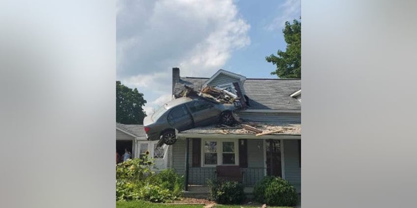 pennsylvania driver hospitalized after bizarrely crashing car into second floor of home