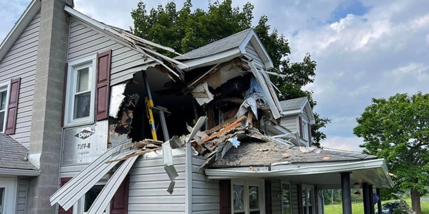 pennsylvania driver hospitalized after bizarrely crashing car into second floor of home