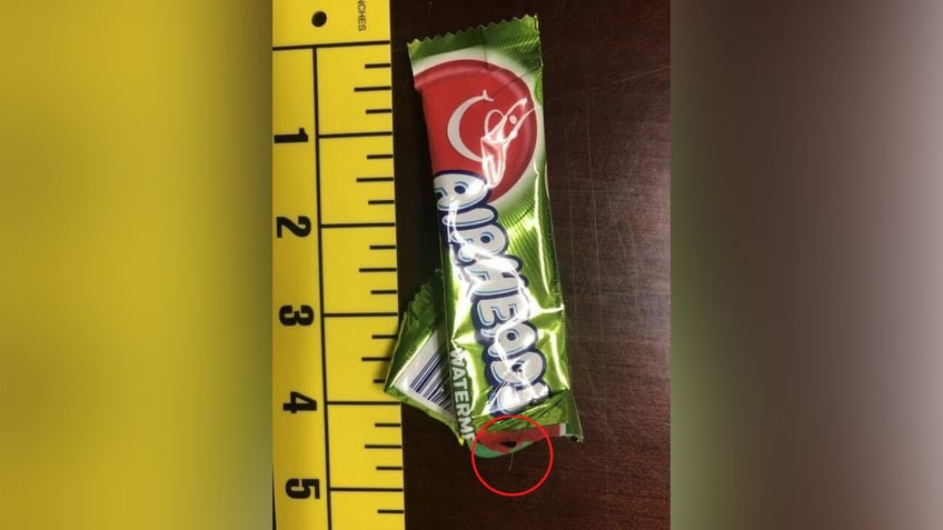 pennsylvania parent takes bite into trick or treat candy finds sewing needle police