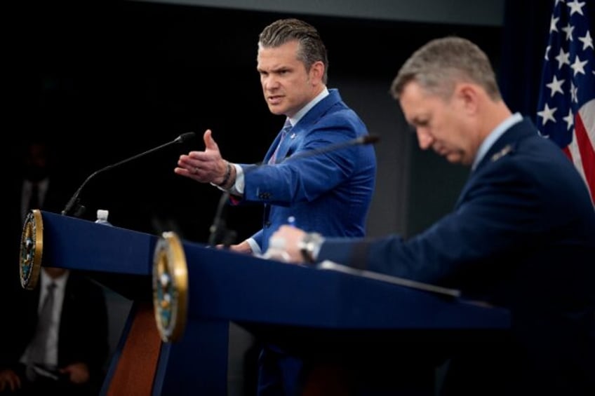 Defense Secretary Pete Hegseth (L) speaks alongside top US military officer General Dan Ca