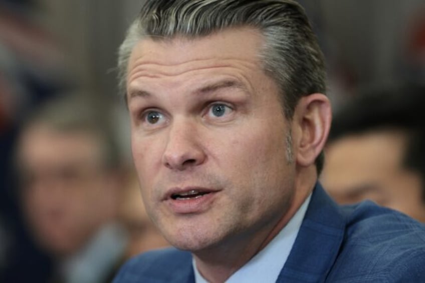 US Secretary of Defense Pete Hegseth speaks to members of the press at the Pentagon in Feb