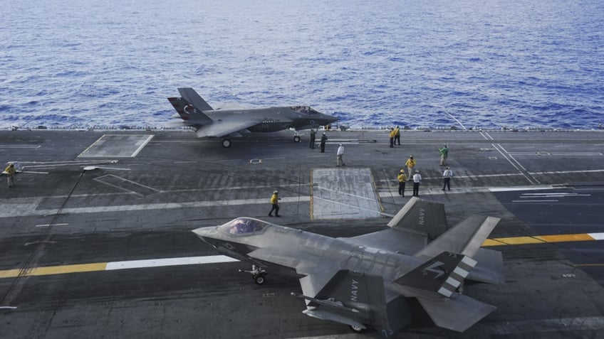 F-35 jets on an aircraft carrier flight deck
