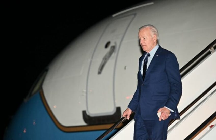 US President Joe Biden steps off Air Force One upon arrival at Joint Base Andrews on June