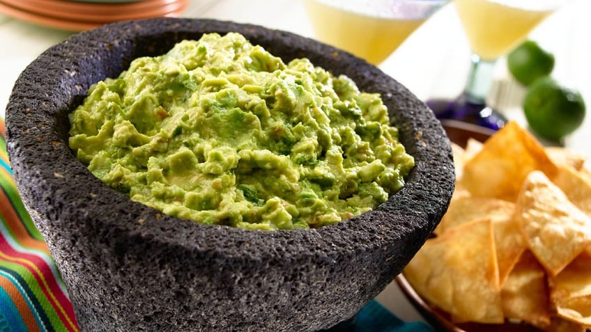 A bowl of guacamole.