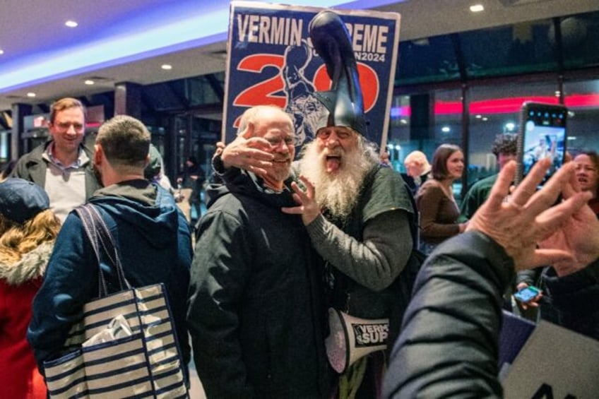 Political satirist and 2024 Democratic presidential hopeful Vermin Supreme mingles with voters outside of former UN ambassador and 2024 presidential hopeful Nikki Haley get-out-the-vote campaign rally in Manchester New Hampshire on January 19, 2024