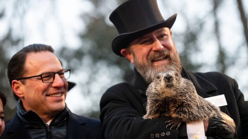 Punxsutawney Phil, two officials