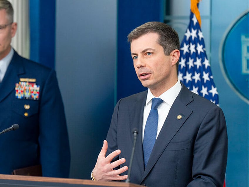 Transportation Secretary Pete Buttigieg speaks alongside Deputy Commandant for Operations