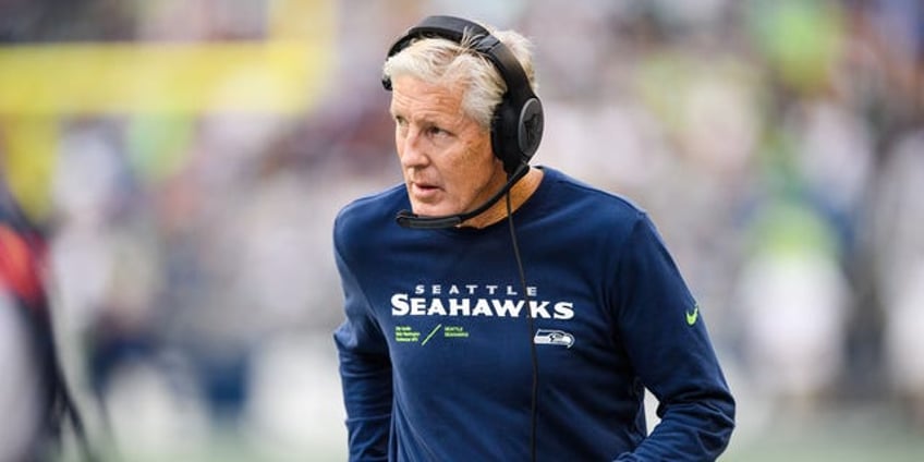 pete carroll plays qb at seahawks practice gets hilarious reactions from snoop dogg will ferrell and others