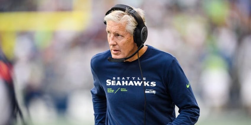 pete carroll plays qb at seahawks practice gets hilarious reactions from snoop dogg will ferrell and others