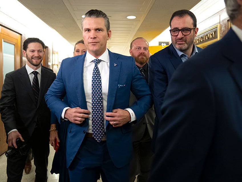 Pete Hegseth, President-elect Donald Trump's choice to be defense secretary, arrives for a